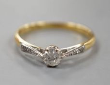 An 18ct and single stone diamond ring, with diamond set shoulders, size R/S, gross weight 2.8