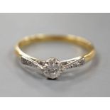 An 18ct and single stone diamond ring, with diamond set shoulders, size R/S, gross weight 2.8