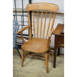 A pair of late Victorian elm and beech Windsor comb back armchairs, width 56cm, depth 47cm, height