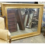 A large reproduction Victorian style gilt framed wall mirror, width 150cm, height 124cm