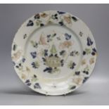 An English polychrome delftware charger,33cms diameter.