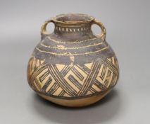 A Chinese neolithic pottery two handled jar - 14cm tallProvenance: the vendor‘s parents lived in