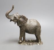 A modern miniature silver model of an elephant, maker CA, (filled), height 19cm.