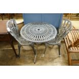 A circular aluminium garden table, diameter 69cm, height 67cm and two chairs