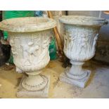 A pair of reconstituted stone campana garden urns, height 52cm