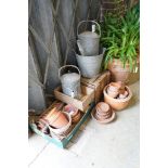 A quantity of vintage terracotta pots, two galvanised cans, bucket and two wood crates