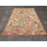 An Anatolian polychrome geometric flatweave Kilim carpet, 290 x 210cm