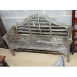 A Lutyens style teak garden bench, length 158cm, depth 51cm, height 98cm