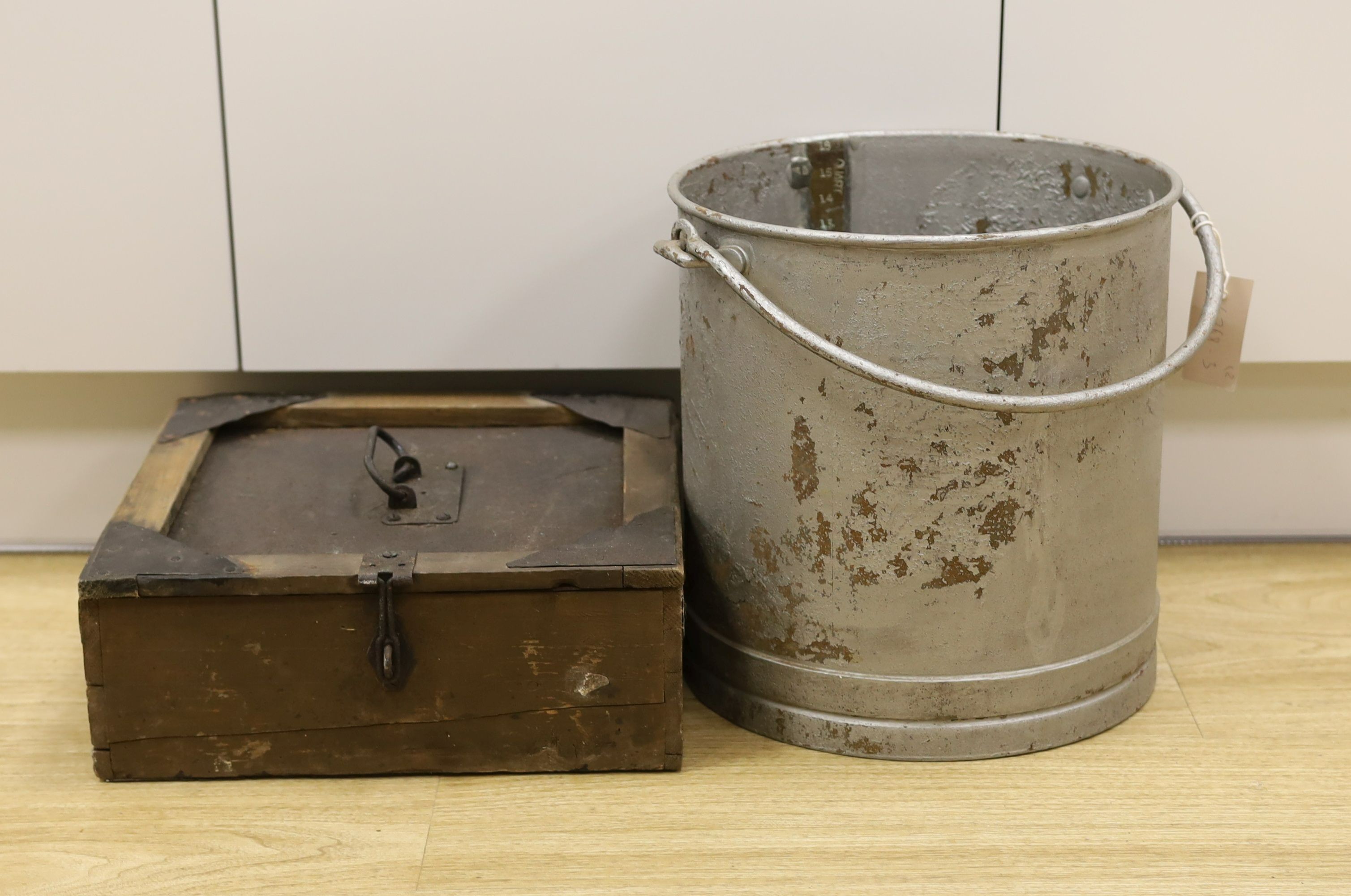 A brass mounted galvanised four gallon bucket and a case of milk sample bottles,Galvanised bucket 31