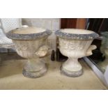 A pair of large circular reconstituted stone garden planters, diameter 56cm, height 63cm