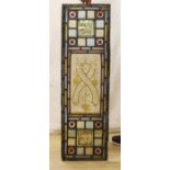 Two pairs of 19th century leaded and stained glass panels,111cms high x 36.5 wide.