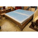A French gilt bed frame, length 202cm, width 180cm, height 52cm