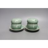 A pair of Korean green glazed pottery tea bowls, cover and stand with strainer each inside - 11cm