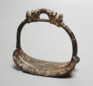 A Chinese archaic (?) bronze stirrup,10 cms high.