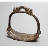 A Chinese archaic (?) bronze stirrup,10 cms high.