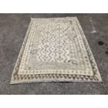 An Anatolian monochrome geometric flatweave carpet, 230 x 175cm