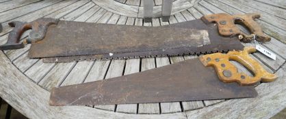 Three vintage hand saws