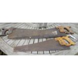 Three vintage hand saws