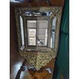 A 19th century Dutch embossed brass wall mirror, width 45cm, height 75cm