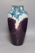 A large Minton Secessionist floral decorated vase,48 cms high-restored.