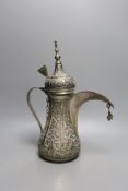 A Middle Eastern white metal dallah, height 36cm.