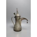 A Middle Eastern white metal dallah, height 36cm.