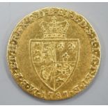 A 1787 gold spade guinea, Good F or better.