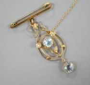 An early 20th century 9c, gem and seed pearl set drop pendant, now with bar brooch suspension,