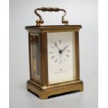 A Mathew Norman miniature brass carriage timepiece,6cms high.