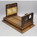 A Victorian walnut stereoscopic viewer and slides, a tinplate viewer, cigarette cards, Glamour