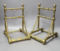 A pair of 19th century Dresser or Godwin style brass fire dogs