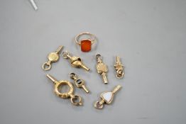 An early 20th century 9ct and carnelian set ring, size K/L, gross 2.7 grams and seven assorted watch