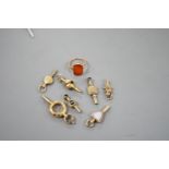 An early 20th century 9ct and carnelian set ring, size K/L, gross 2.7 grams and seven assorted watch
