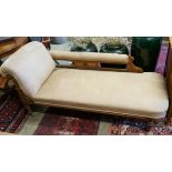 A late Victorian carved oak chaise longue upholstered in fawn suede, length 180cm, depth 70cm,