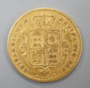 A Victorian 1871 gold shield back half sovereign, London Mint.