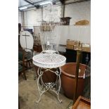 A white painted wirework birdcage, height 110cm together with a painted metal garden bar table