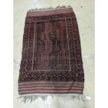 A Belouch red ground rug and a prayer rug, largest 178 x 106cm