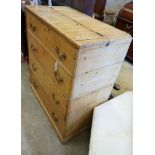 An early 19th century pine "Scottish Press" with hinged top over two drawers, width 92cm, depth