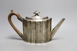 A George III engraved silver oval 'batwing' shaped teapot, George Smith II, London, 1788, gross