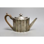 A George III engraved silver oval 'batwing' shaped teapot, George Smith II, London, 1788, gross