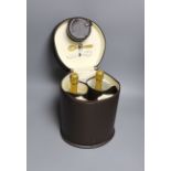 A Connolly leather Krug champagne carrier with dust cover, containing: two half bottles, two