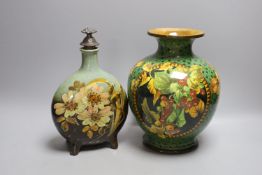 A Doulton Burslem vase, by Margaret M Armstrong and a French art pottery flagon with flower design