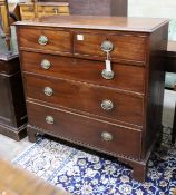 A George III mahogany straight front chest, fitted three long drawers and two short drawers, width