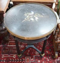 A Victorian circular gilt metal mounted ebonised centre table with pietra dura top, diameter 57cm,