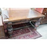 A 17th century style rectangular oak draw leaf dining table on carved baluster legs, 275cm extended,