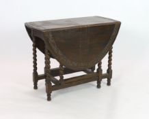 An early 20th century 18th century style oak gateleg dining table, width 98cm depth 46cm height