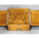 A late Victorian oak stationary box,30 cms high.