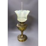 An oil lamp with vaseline glass shade - 56cm tall