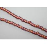 A single strand iridescent art glass bead necklace, with yellow metal clasp, 56cm.