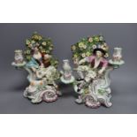 A pair of Chelsea Derby twin sconce candelabra figures, c.1770 - 28cm tall